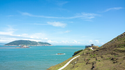 Fototapeta na wymiar Daqiu island in Taiwan. A seaside trail to the pavilion on the seashore.