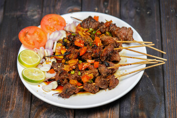 Sate Kambing or satai goat is a food made from young goat meat which is stabbed with a stick and then burned using wood charcoal.