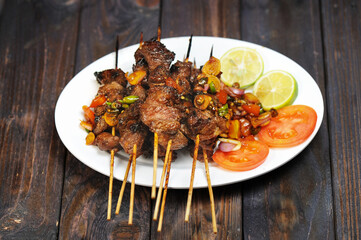 Sate Kambing or satai goat is a food made from young goat meat which is stabbed with a stick and...
