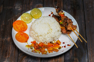 Sate Kambing or satai goat is a food made from young goat meat which is stabbed with a stick and then burned using wood charcoal.