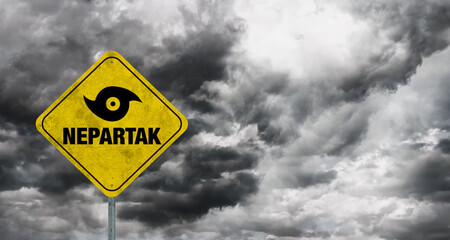 Tropical storm Nepartak banner with storm clouds background.