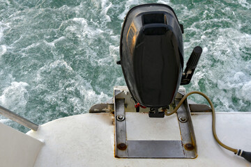 Motor on a motor ship going by the sea. Summer boat trips.