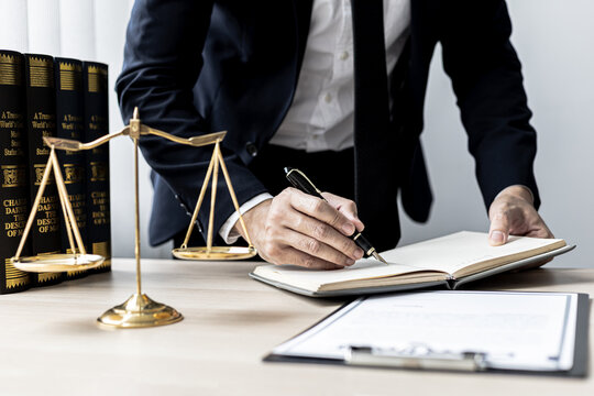 A lawyer man is seeking information on a fraud case to bring to court in a lawsuit from which a client has filed a lawsuit against an employee at a company that commits fraud. Fraud litigation concept