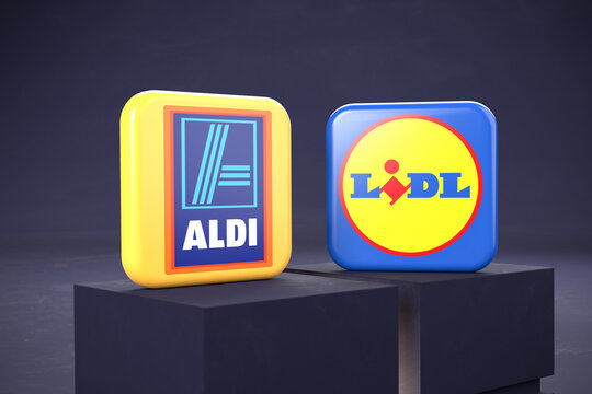 Aldi vs Lidl concept: logos of the two competing discount super markets standing on two pedestals.