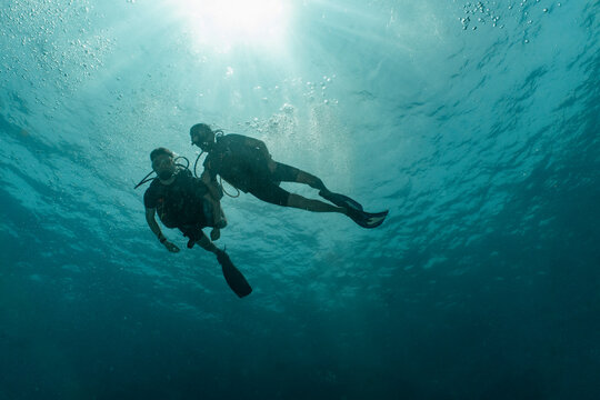 divers on honeymoon exploring the tropical waters around Phuket