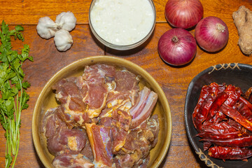 Preparation of ingredients for a mutton dish called Laal Maans a delicacy of Rajasthan India
