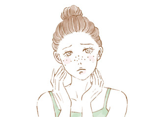 そばかすができた肌に悩む女性
