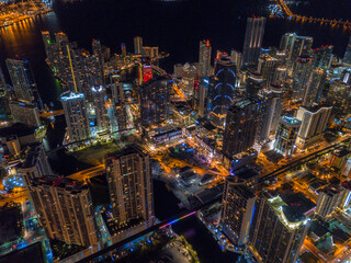 epic drone shot of downtown miami skyline at night