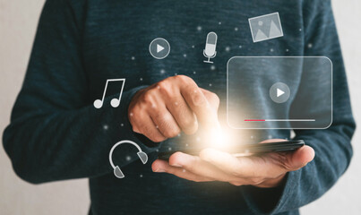 Close up hands holding smartphone. man using cellphone for streaming online watching video on internet live concert show or tutorial.technology business investment and education concept