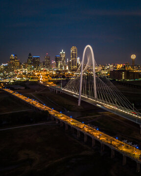 Wide Drone Shot Of Downtown Dallas Skyline With Large Bridge In Foreground