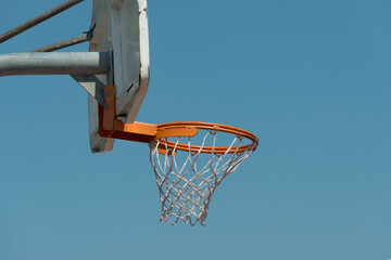 basketball hoop on the background of blue sky