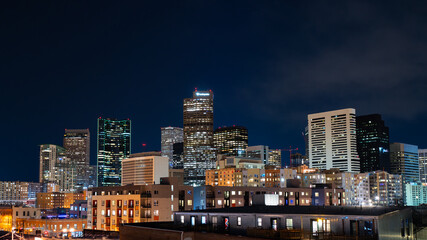 amazing landscape shot of downtown denver at night from a rooftop