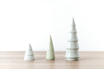 Minimal three concept christmas trees new year celebration symbol interior design