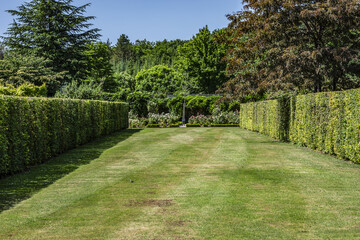 Garden beside Chateau de Beauregard (1545) in Loire Valley in France. It is located on territory of commune of Cellettes, a little south of city of Blois.