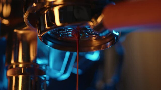 Slow motion pour espresso rom bottomless portafilter with neon light