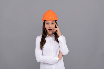 amazed inspired with idea architect woman in safety hardhat and white shirt, inspiration