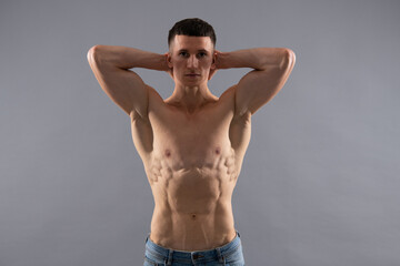 Fototapeta na wymiar Improve your muscular fitness. Strong man show fit torso and arm biceps triceps. Muscular strength.