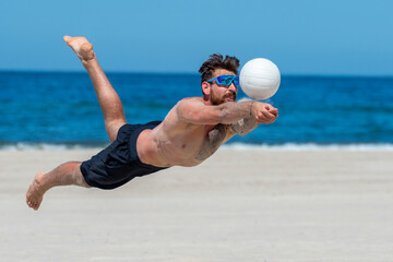 Professional beach volleyball player in action, receiving the ball. Horizontal sport poster, greeting cards, headers, website