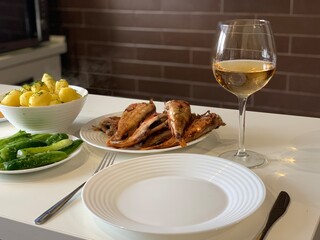 Fried fish, boiled young potatoes, lightly salted cucumbers.