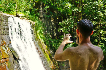 Taking a picture of a waterfall 