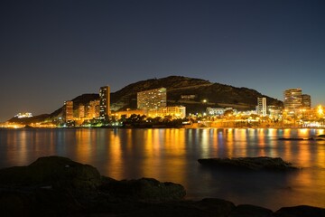 Obraz premium Night view of Alicante, Albufereta beach. Spain.