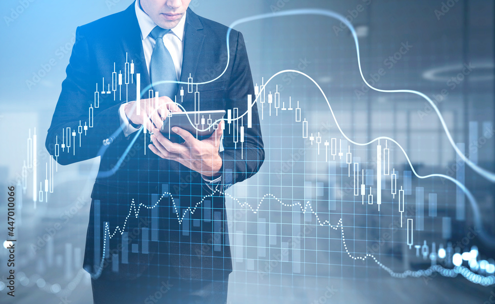 Poster front view of trader with tablet in hands trades on stock market