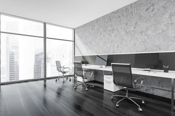Three workplaces in the office corner with panoramic windows in grey