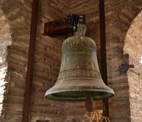 Fototapeta premium Old bell in a tower of an old building