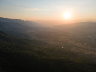 Naklejka na ściany i meble Aerial Sunset view of Belasitsa Mountain, Bulgaria
