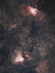 Fototapeta na wymiar The Eagle (M16) and Omega (M17) Nebulae from Christchurch, New Zealand, July 2021. (Mosaic from 6x30min @ 400mm f/2.)