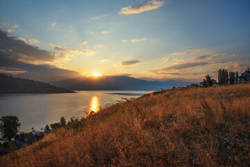 Dawn over mountains and river
