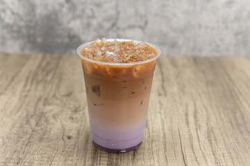 Dirty taro latte cold beverage mixes iced boba drink for a refreshing beverage