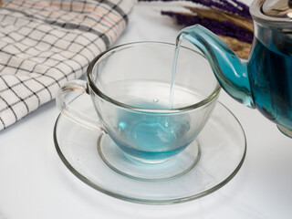 A cup of blue tea that made from buterfly pea flower