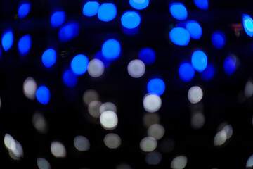 Fototapeta na wymiar Blurred lights bokeh at night.