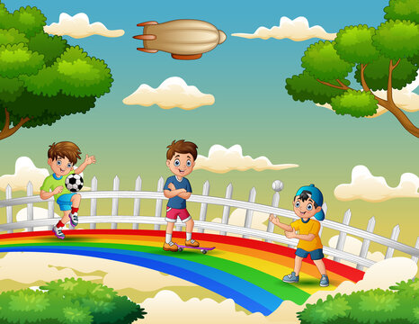 Happy three of boys play different activities over the rainbow