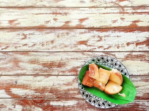 Thai toasts sprinkled with sweetened condensed milk and sugar.