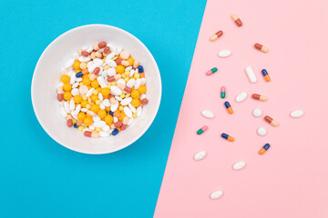 Global Pharmaceutical Industry and Medicinal Products - Colored Pills and Capsules in White Dish on...