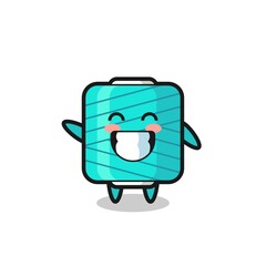 Fototapeta premium yarn spool cartoon character doing wave hand gesture