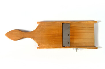 Old wooden grater for vegetables.