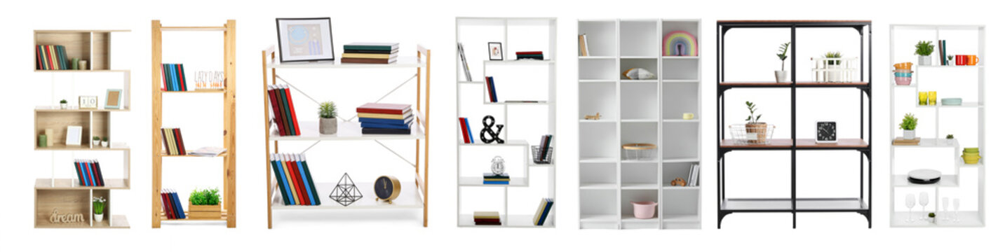 Set of stylish shelf units with decor on white background
