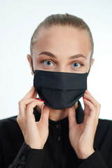 Young woman in epidemic mask