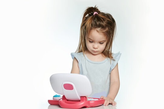 Kid Play With Toy Laptop Isolated