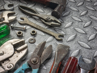 Fototapeta premium tools on Checker plate for safety or engineer concept.