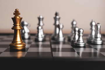 Closeup of chess characters on board games. to represent decision making in term of business strategy to find out the best solution to meet target objective and goal.	

