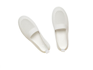 Top view of white sneakers made of mesh fabric isolated on a white background.