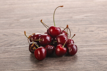 Ripe sweet cherry berries heap