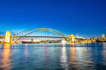 Fototapeta na wymiar Sydney Harbour Bridge at night. It's a famous tourist attraction.