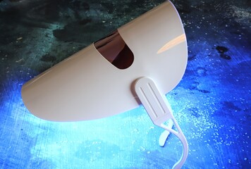 LED Light Therapy Face Mask.  At home beauty facial rejuvenation. Blue light for acne