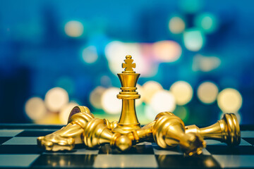 Closeup of chess characters on board games. to represent decision making in term of business strategy to find out the best solution to meet target objective and goal.   © czchampz