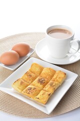 egg french toast bread set with half boiled egg and coffee or tea in white background asian halal menu